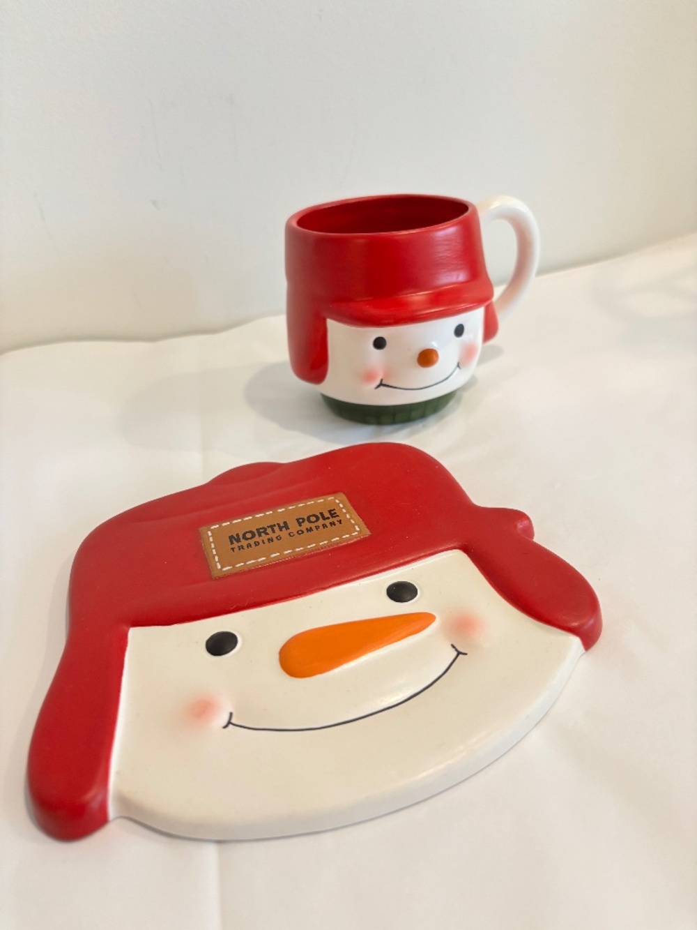 HALLMARK North Pole Trading company ceramic smiling snowman SET trivet & mug red